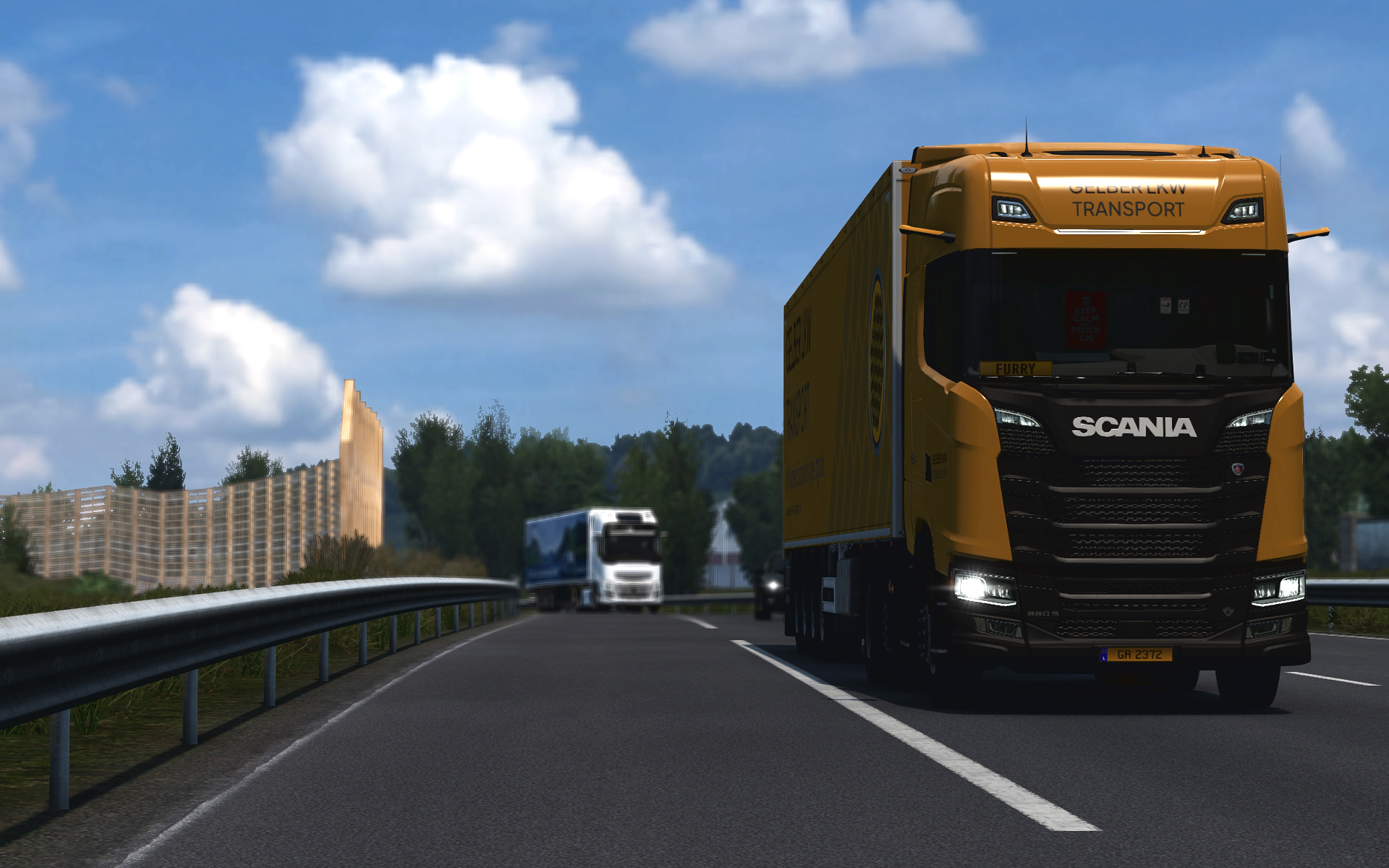 Gelber LKW Scania